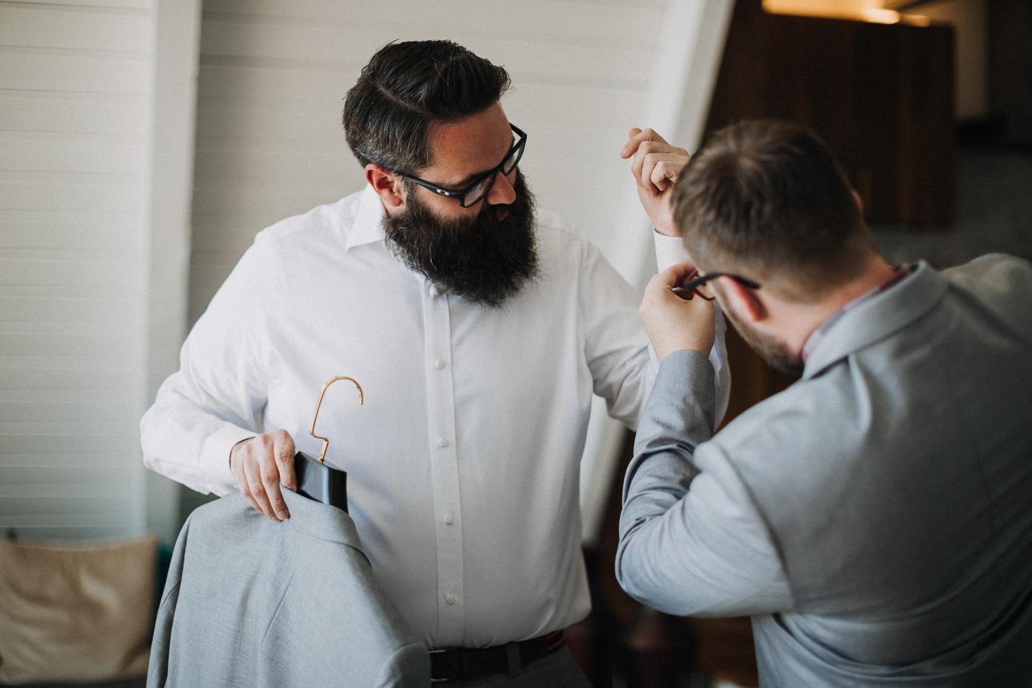 Groom and best man getting ready